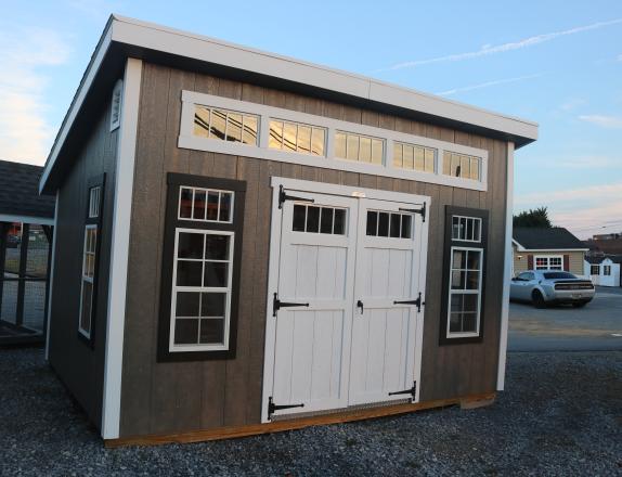 Pine Creek 10x14 Studio Lean-To with Driftwood walls, White trim, and Charcoal shingles