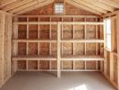 10x14 Peak Style Portable Storage Shed with Pebble Clay Vinyl Siding, Black Wood Doors, and Shelves Built Inside